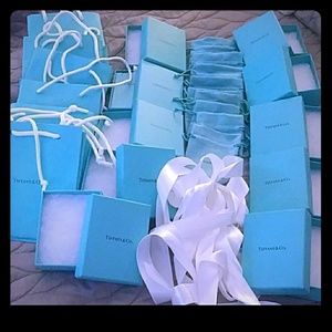 COPY - Tiffany & Co. bags, boxes, pouches, and ribbons.